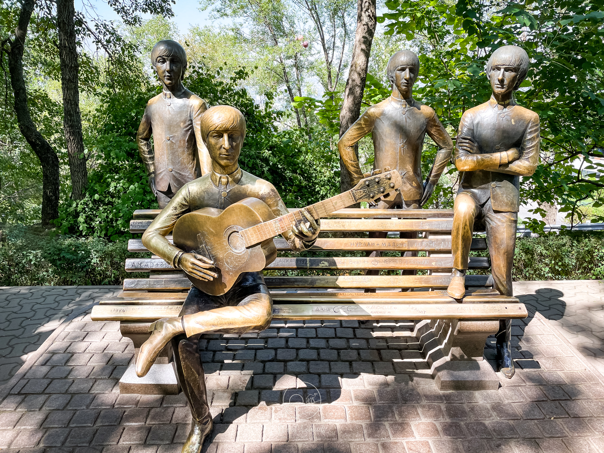 On Kok Tobe, you will find an amusement park and a Beatles statue
