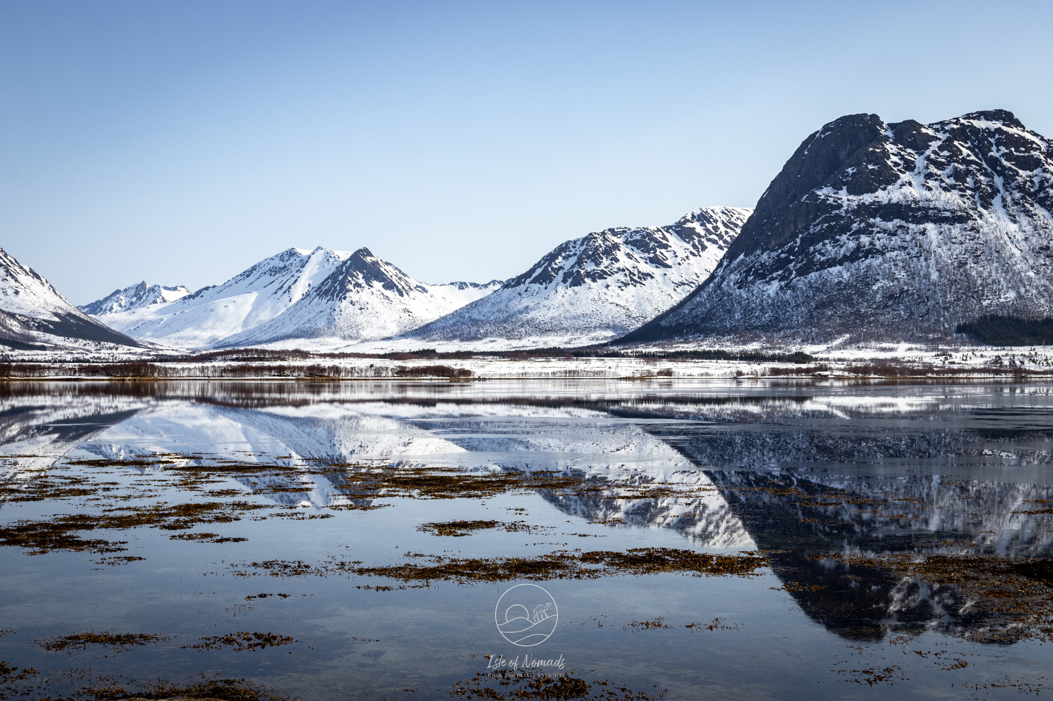 Beautiful water reflections on our way to Andøya