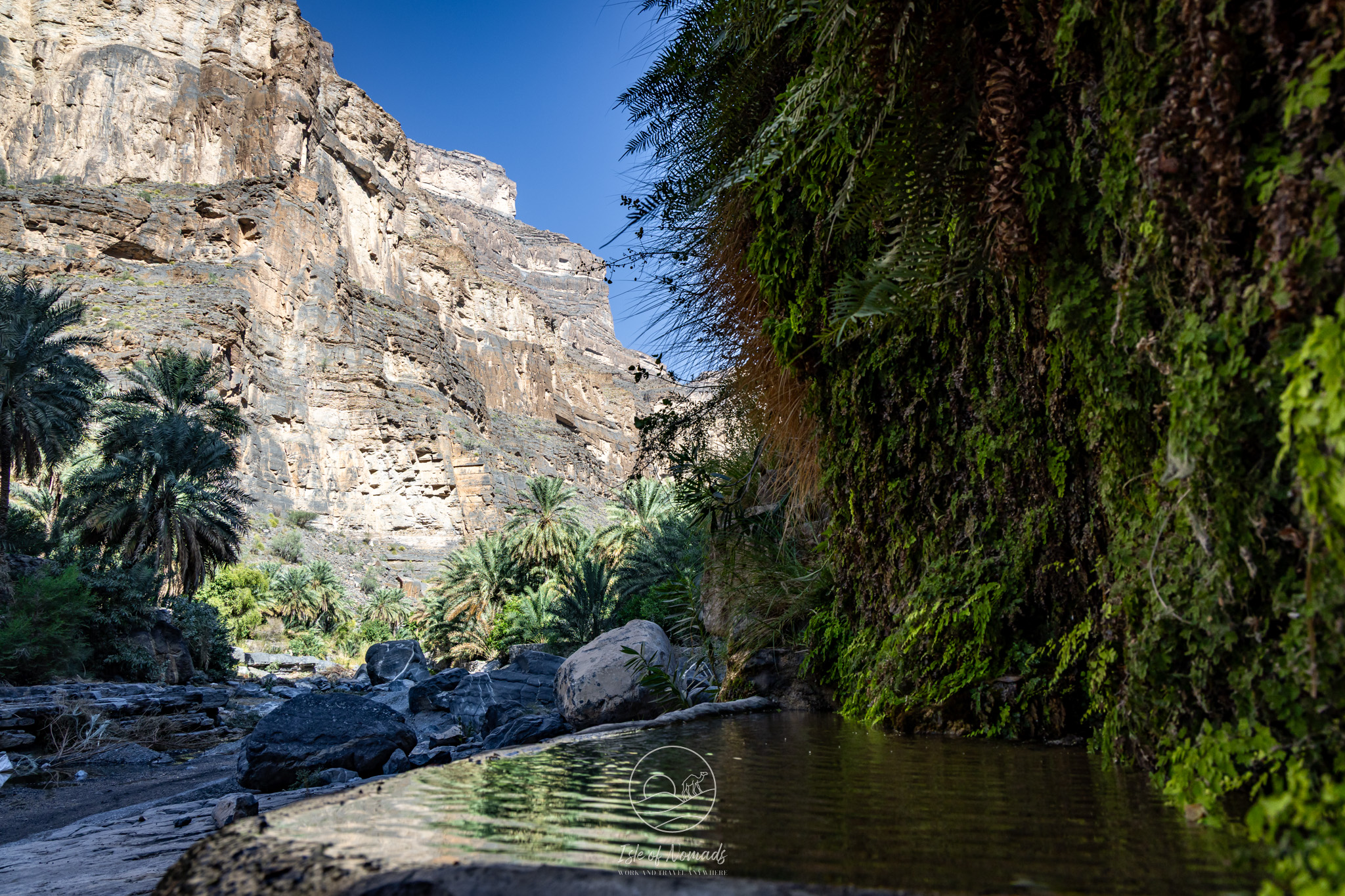 Seeing the impressive canyon from below in Wadi Ghul